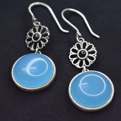 92.5 silver dangler earrings with round aqua drop stone.