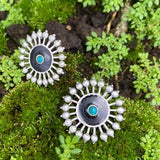 92.5 silver studs with black enamel work.