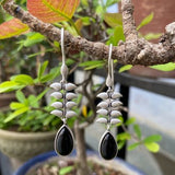 92.5 silver dangler earring with black drop stone.