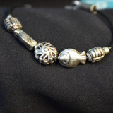 92.5 Silver openable charm bracelet with leather string!