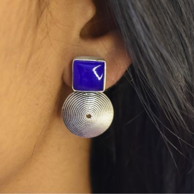 92.5 silver studs with royal blue stone.
