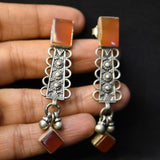 92.5 Silver danglers with rust coloured stone!