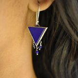 92.5 silver dangler earrings with hanging blue glass stone.