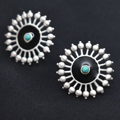 92.5 silver studs with black enamel work.
