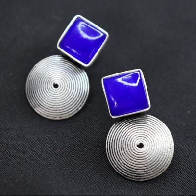 92.5 silver studs with royal blue stone.