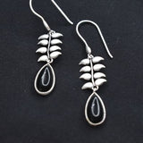 92.5 silver dangler earring with black drop stone.