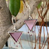 92.5 silver dangler earrings with hanging pink glass stone.